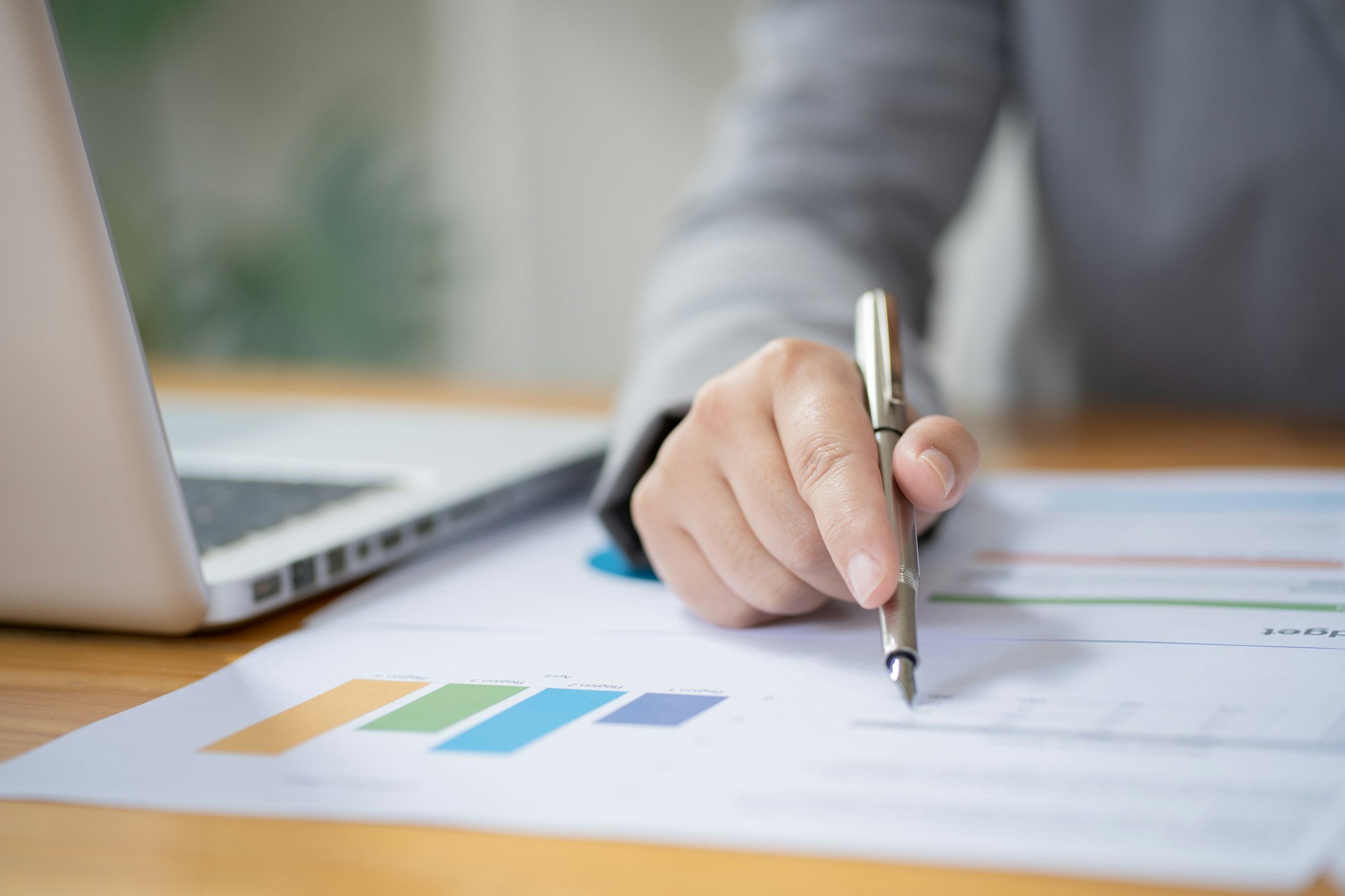 Businesswoman Accountant analyzing investment charts Invoice