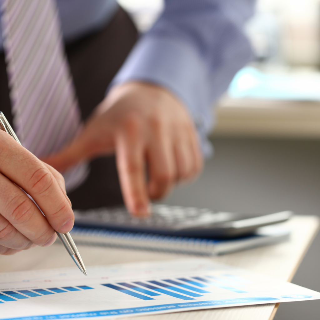 man analyzing the blue bar graph