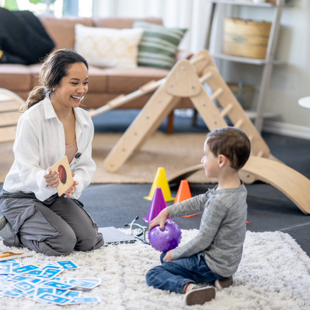 therapist showing a small box to a kid